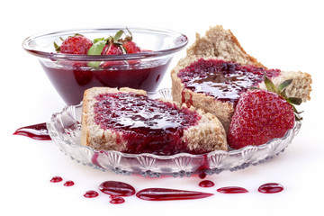 Homemade organic strawberry jam on wholemeal bread