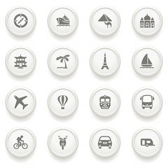 Travel icons on gray buttons.
