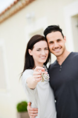 happy young couple welcome in new home