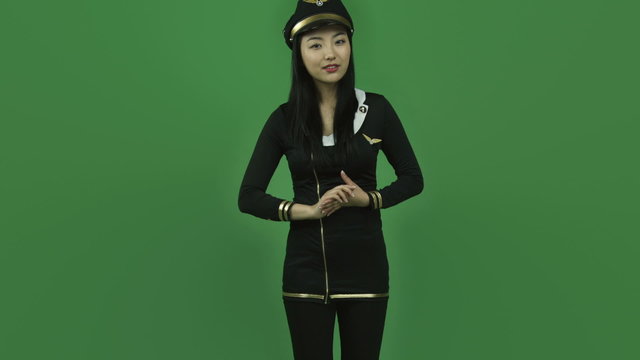 Asian air hostess isolated greenscreen green background