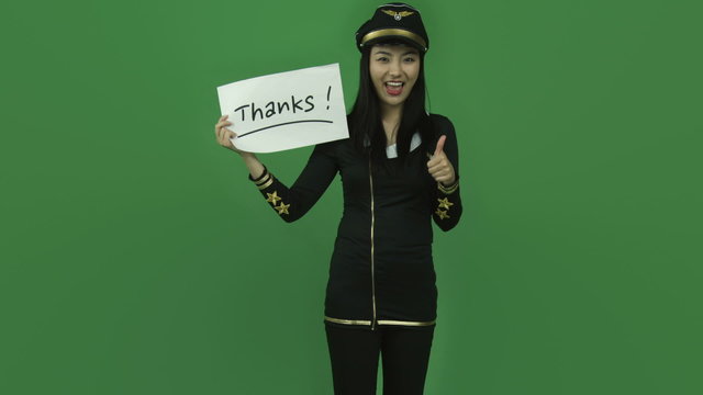 Asian air hostess isolated greenscreen green background grateful