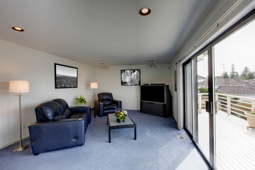Living room with walkout deck