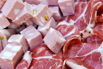 Ham and mortadella on a buffet