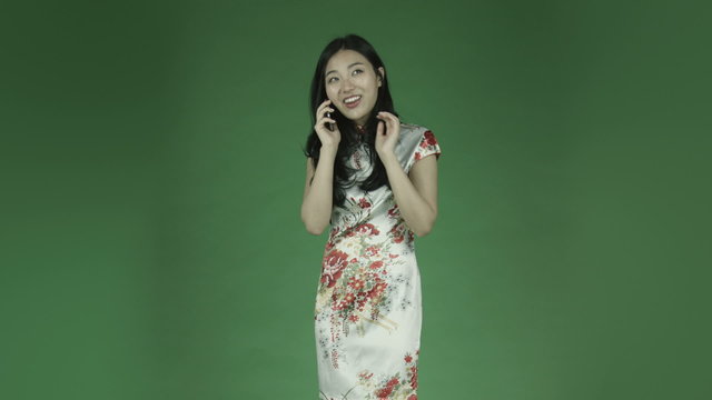 young asian adult woman isolated on green-screen background