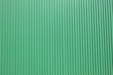Obraz premium 緑の縦溝外壁