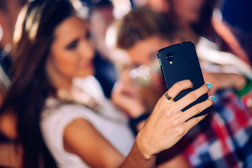 Party people taking selfie