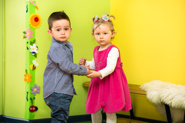 Two kids in Montessori preschool Class.