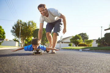 father son skateboard