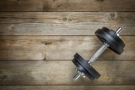 exercise concept - iron dumbbell