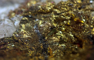 Crystal,nugget, gold, bronze, copper, iron. Macro. Extreme close