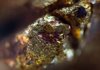 Nugget, gold, bronze, copper, iron. Macro. Extreme closeup