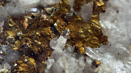 Nugget, gold, bronze, copper, iron. Macro. Extreme closeup