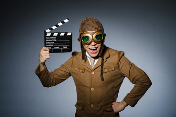 Funny pilot with goggles and helmet