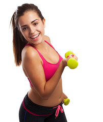 Pretty teenager with weights isolated on a white background