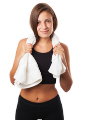 pretty young sporty woman with a towel isolated on white backgro