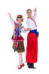 beautiful dancing couple in ukrainian polish national