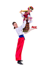 beautiful dancing couple in ukrainian polish national