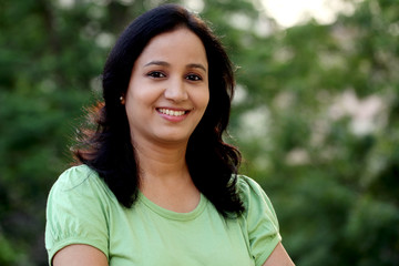 Portrait of young woman at outdoors