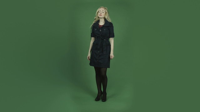 caucasian woman in blue dress isolated on chroma green screen