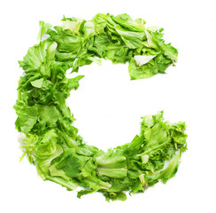 c lettuce letter on a white background © asierromero