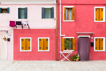 Fototapeta na wymiar Blue building facade in Burano, Italy