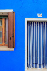 Blue building facade in Burano, Italy