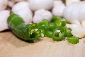 green hot chilli peppers and mushrooms