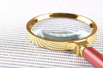 magnifying glass on the digital code