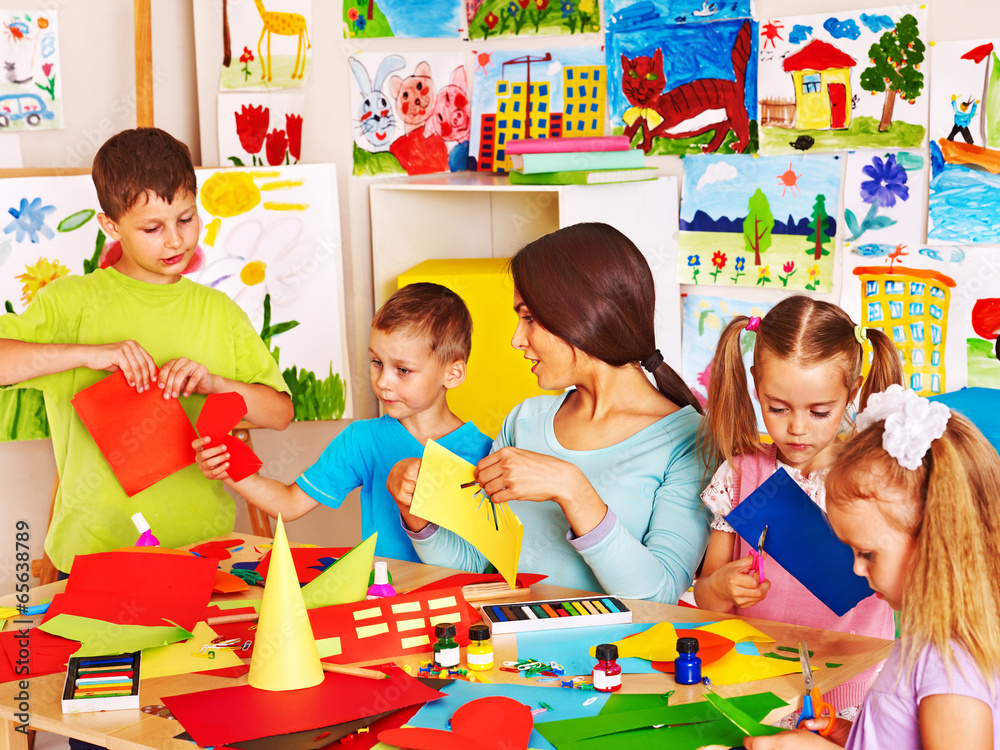 Wall mural children with teacher at classroom.