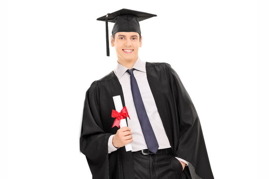 Male graduate holding a diploma