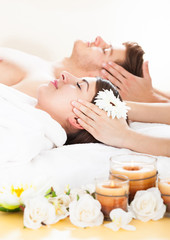 Fototapeta na wymiar Couple Receiving Head Massage
