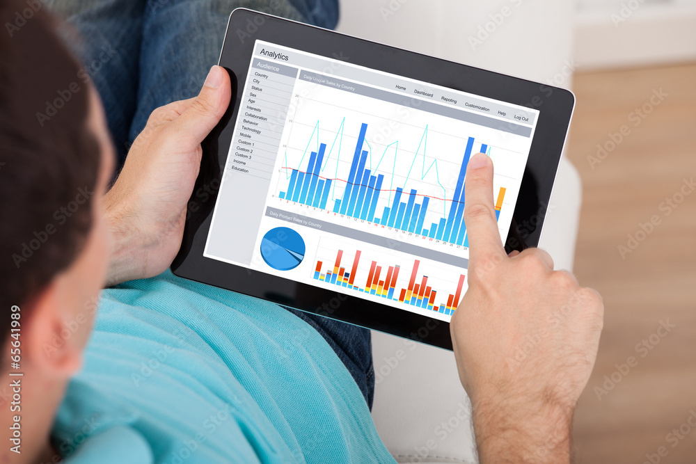 Poster Man Analyzing Graphs On Digital Tablet