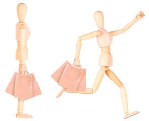 happy wooden Dummy with shopping bags