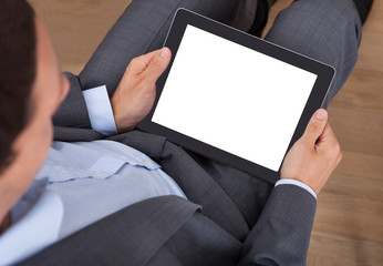 Businessman Holding Digital Tablet