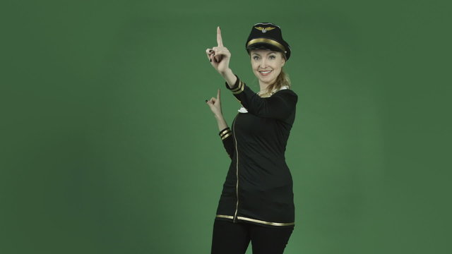 caucasian air hostess isolated on chroma green screen background