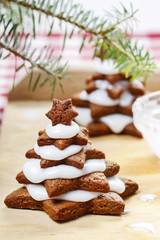 Gingerbread christmas tree on wooden table. Beautiful xmas set