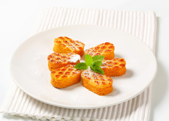 Small oval-shaped cakes