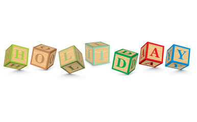 Word HOLIDAY written with alphabet blocks