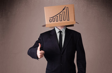 Businessman gesturing with a cardboard box on his head with diag