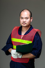 Foreman holding clipboard