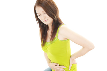 腰痛を訴える女性