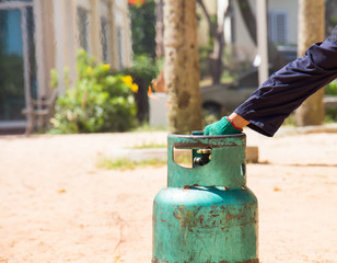 Demonstration of fire caused by gas canisters by hand