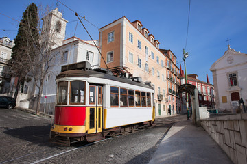 Fototapeta na wymiar Historic Tram in Alfama District of Lisbon