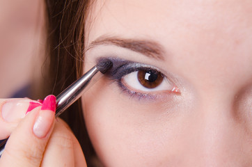 Makeup artist paints the shadows forever