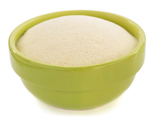 semolina in plate bowl on white
