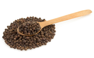 dried dill seeds in spoon on white