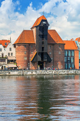 Fototapeta premium The medieval port crane over Motlawa river in Gdansk, Poland