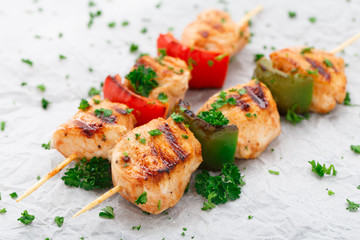 Grilled chicken skewers with paprika