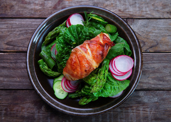 chicken fillet wrapped in prosciutto ham with asparagus