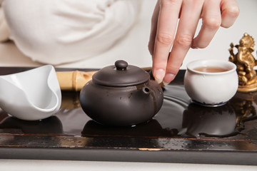 Chinese tea ceremony is perfomed by master